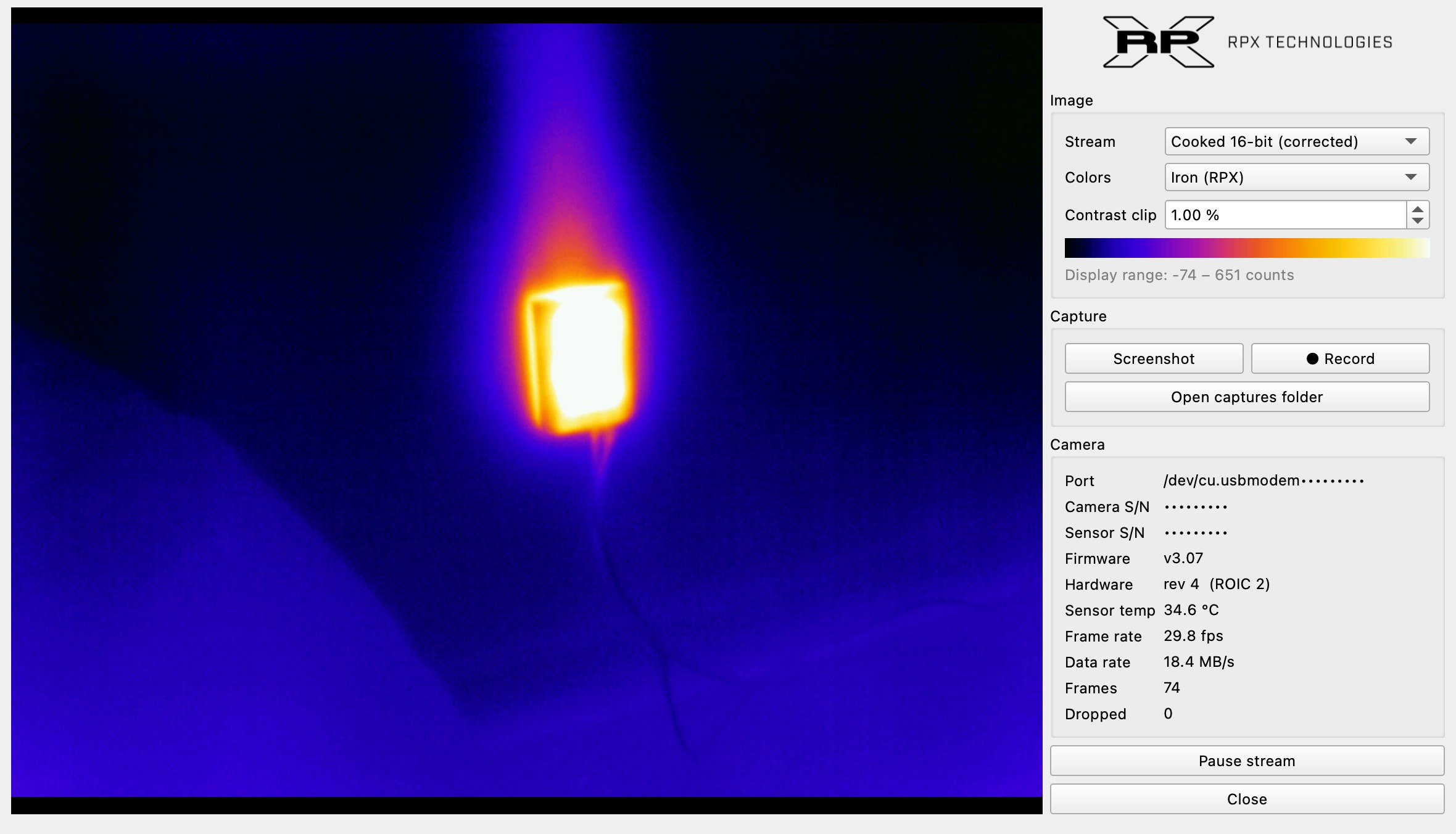 RPX Thermal Viewer showing a hot device on a cable, with heat rising above it, against a cool background in the Iron palette, with stream, palette, capture and camera details in the sidebar